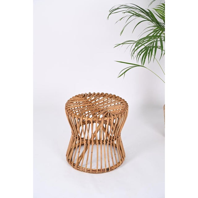 Fantastic mid-century stool in curved bamboo and rattan. This incredible rare piece was produced in Italy during the 1960s...