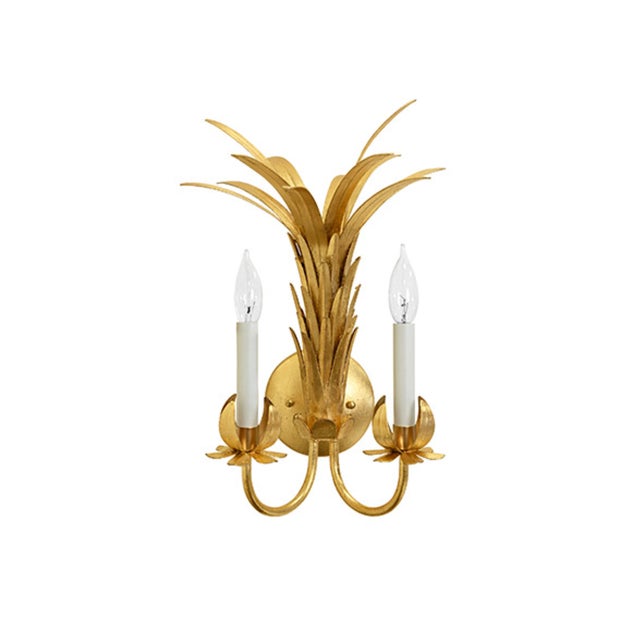 Bring tropical elegance to your walls with this striking two-arm tole wall sconce finished in shimmering gold leaf. Each...