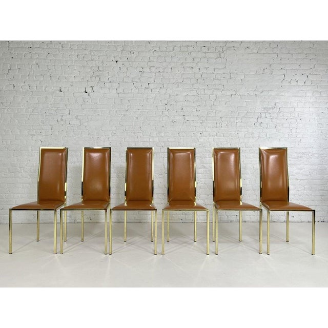 1970s Italian Renato Zevi Design Leather And Brass Set of 6 Chairs composed of a brass structure adorned with cognac...