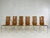 1970s Italian Renato Zevi Design Leather And Brass Set of 6 Chairs composed of a brass structure adorned with cognac...