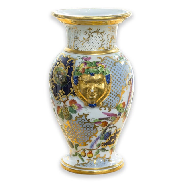A pair of antique 19th century hand painted porcelain vases. A stunning pair of antique vases. Each of these white...