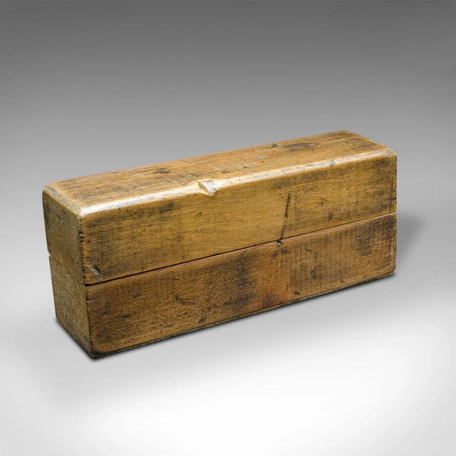 This is an antique engineer's letter punch set. An English, beech and steel tool engraving block, dating to the late...