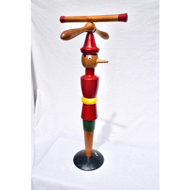 Scarcely seen handcrafted valet stands "Pinocchio & Jiminy Cricket" made in Italy c. 1940's, after the children's novel,...