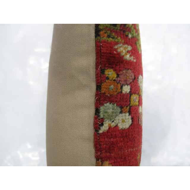 One of a kind Pillow made from a vintage turkish rug with cotton back. Zipper closure and foam insert provided. 17'' x...