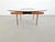 Round Glass Coffee Table with Wood X-Base, 1970, in Very Good conditions. Designed 1970 to 1979