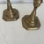 A pair of antique brass candlesticks. Perfect for your dining table or accessorize your cocktail table with these...
