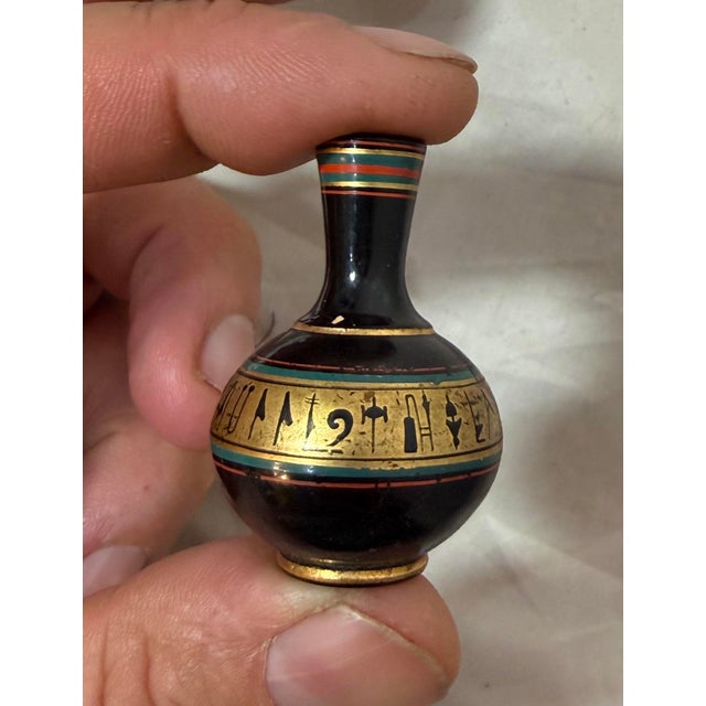 Up for sale is an exquisite antique hand-painted miniature Greek black glazed dollhouse pottery vase. It is a handmade,...