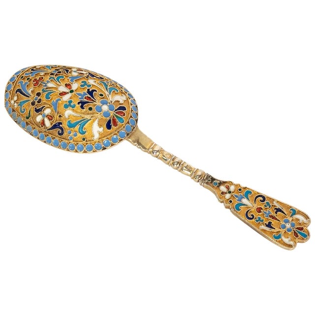 A fine antique Russian Imperial silver gilt & cloisonne enamel tea caddy spoon, Moscow, circa 1880. The shovel shaped...