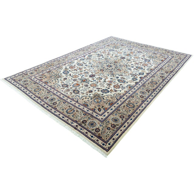 This elegant, hand-knotted Kashmar Oriental rug, crafted from high-quality cork wool, is distinguished by its delicate...