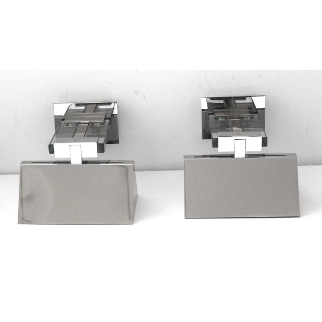 This stylish pair of wall sconces were designed by M.aura Martini for Fratelli Martini and the date to the late 1980s to...