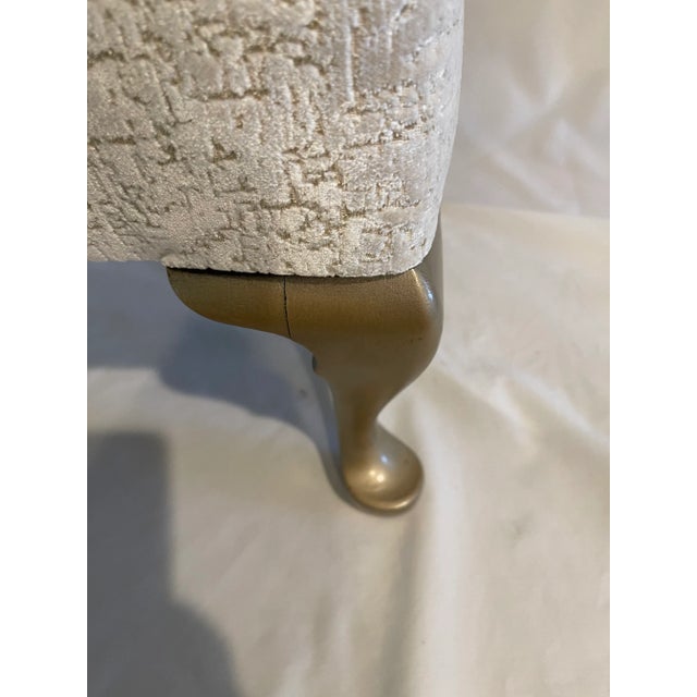 Textured velvet upholstery weight footstool with wooden legs