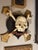 Rare hand sculpted, painted and parcel gilt skull and crossbones Memento Mori Style wall hanging sculptural object. The...