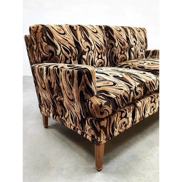 Groovy Vibes! This vintage sixties sofa is definitely a unique copy. The sofa has very comfortable seating comfort with...