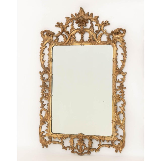 Rococo Style Silvered and Gilt Composition Framed Mirror, reticulated scrolling foliate design frame centering a...