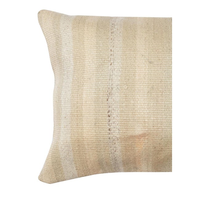 Add a touch of history and warmth to your space with this vintage handmade natural hemp kilim cushion cover. Crafted from...
