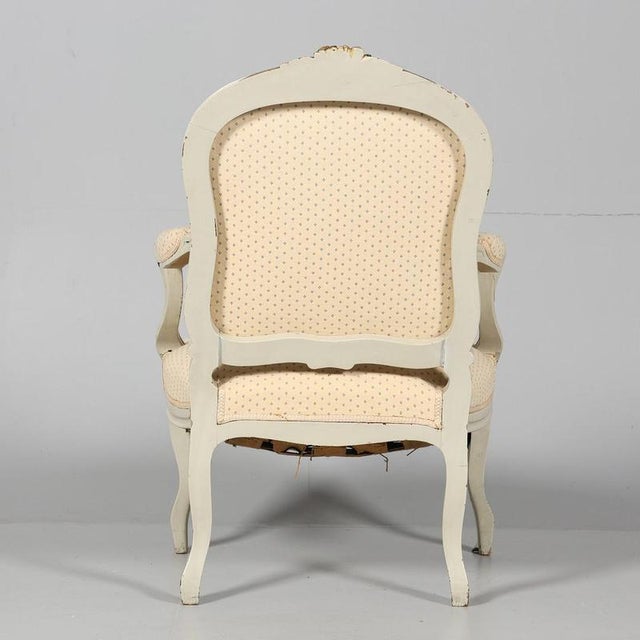 This is a Classic pair of original Swedish Gustavian neo rococo early 1900s armchairs in probable original paint with...