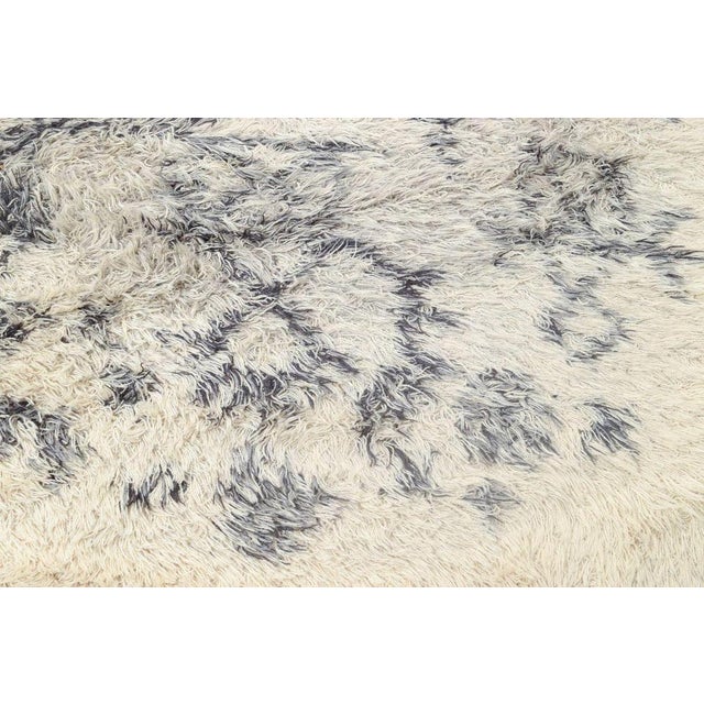 Clara Salander (1922-2025) “Vikingstad”, rya carpet, 1960/70s. Large hand-knotted rya rug in wool with an abstract pattern...