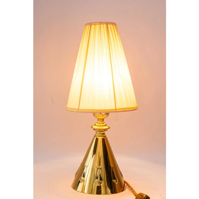 Brass polished and stove enameled The fabric shade is replaced ( new ) European Plug (up to 250V).The wiring of this item...