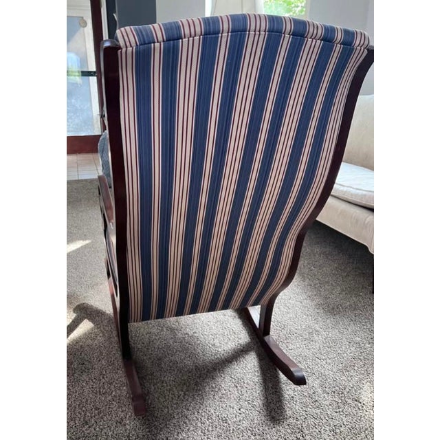Red/White/Blue Stripe Upholstered Mahogany Rocking Chair. Beautiful wood and upholstered rocking chair. In great shape for...
