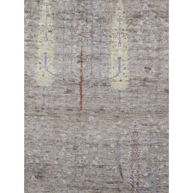 Tribal Hand-Knotted Area Rug is handmade with extra high pile and very simple, stylized designs. They are constructed from...