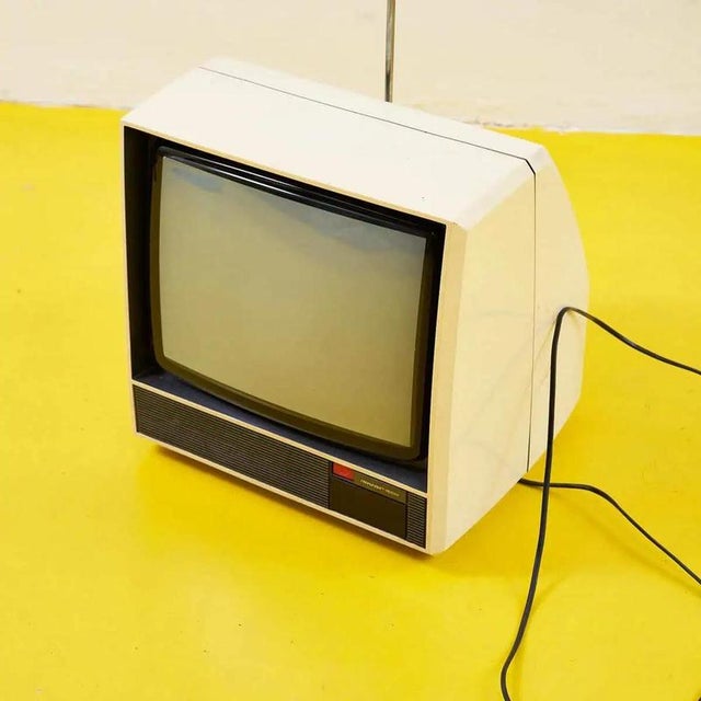 Discover the charm of the past with this adorable mivar television, an authentic piece of vintage design from the 1970s....