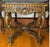 Vintage Italian Renaissance style carved walnut table featuring a hexagonal black Portoro marble top. Very substantial,...