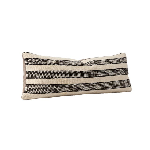This beautiful 16'' x 48'' pillow cover was made from authentic Turkish Kilim pieces. Bright colors of wool adorn the...