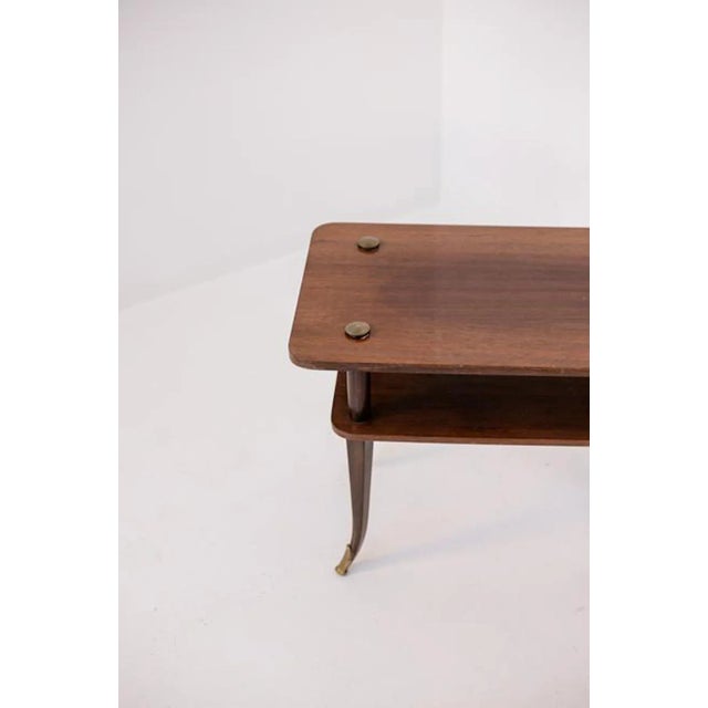 Lovely Italian wooden coffee table from the 1950s. The coffee table is made of wood with a rectangular shape. The...