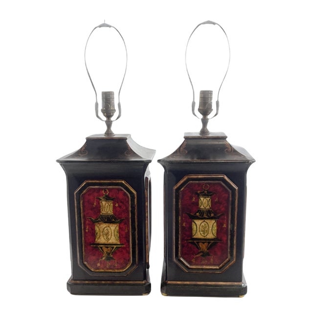 Illuminate your space with our Pair of English Style Tole Cannister Lamps. These lamps are not just light sources, but...