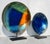 Beautiful mid-20th-century pair of bright enamel shallow bowls. Bright peacock blue dominates the pattern, and shades of...