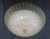 Italian flush mount with a Murano glass diffuser hand blown in Graniglia technique to produce granular texture, mounted on...