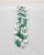 This is part of Chairish’s Costume Jewelry assortment. 1950s or early 1960s goldtone ovoid white and green "moonglow"...