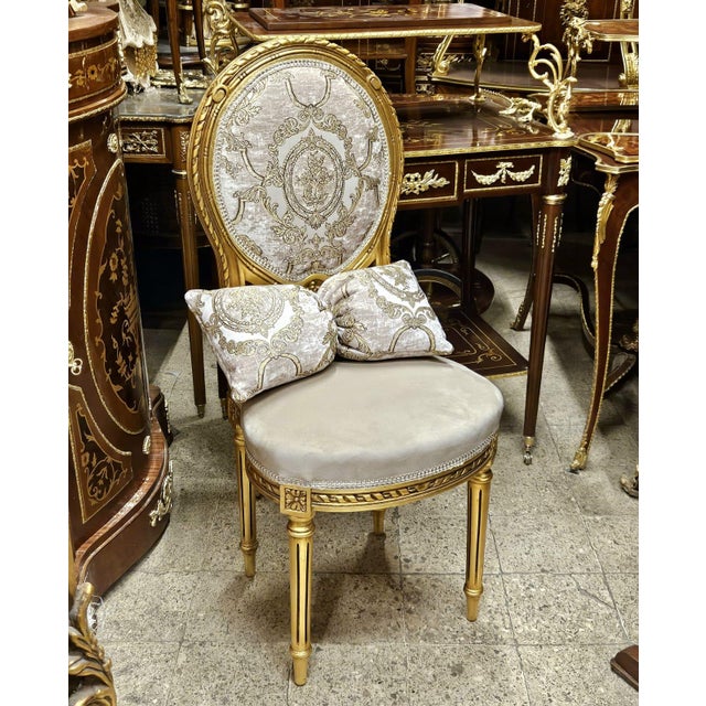 Bring timeless French elegance into your home with this exquisite Louis XVI style accent chair. Featuring a beautifully...