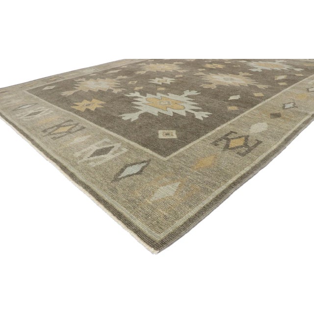 Earth-Tone Turkish Oushak Rug with Modern Neutral Southwest Style 09'03 x 12'01. With its bold expressive design,...