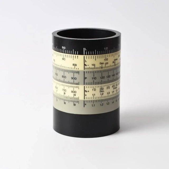 Vintage pen holder (pencil cup) with adjustable conversion scales. Designed by Ole Jorgensen. Made in Denmark in 1970s....