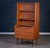 Beautiful Danish bookcase from the 1960s crafted in warm teak wood. Features three spacious drawers with elegant handles...