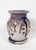 A signed studio pottery luminary candle holder with a matching small trinket dish / underplate. The piece has a sculptural...
