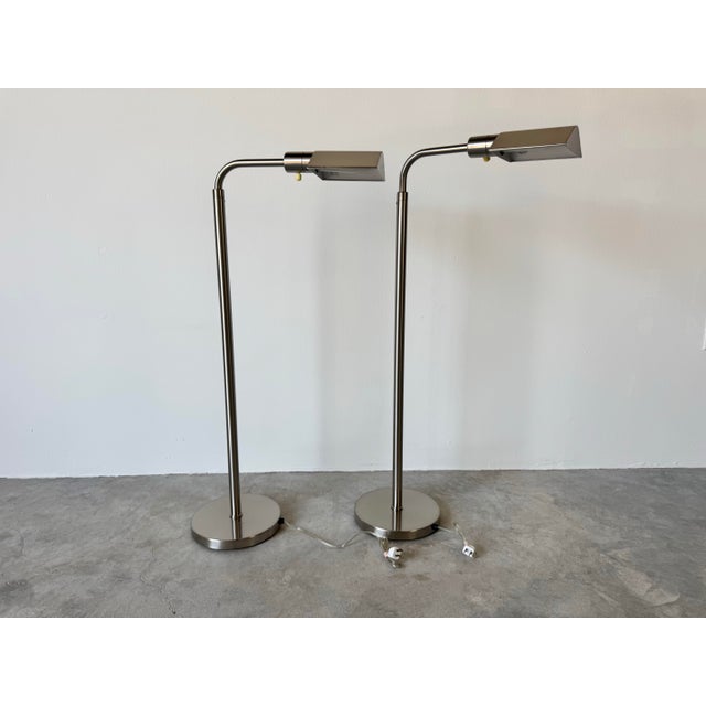 This exquisite pair of vintage chrome floor lamps, designed by George Hansen and produced by Metalarte in Spain, showcases...