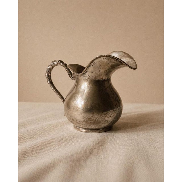 This vintage hammered silver plated creamer from the 1920s by Calegaro, Padua is a beautiful example of Italian...