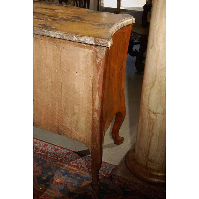 Hand carved, Genovese, serpentine, two-door cabinet veneered in walnut and pear woods with its original bronze...
