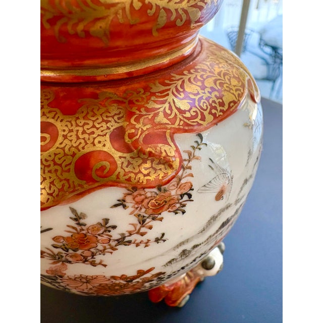 This exquisite Japanese Kutani porcelain ginger jar showcases the richly layered artistry the region is known for,...