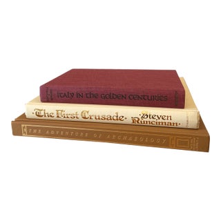 Stack of Three Vintage Tan Cream and Red Hardback Books For Sale