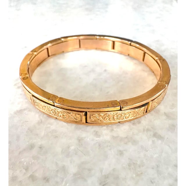 Rare “Triple Crown” floral embossed bracelet made by the Ostby and Barton Company of Providence, Rhode Island. Bracelet is...