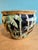 This is a vintage Andrea by Sadek “Tropical Jungle” ceramic planter featuring hand-painted palm and bamboo designs by...