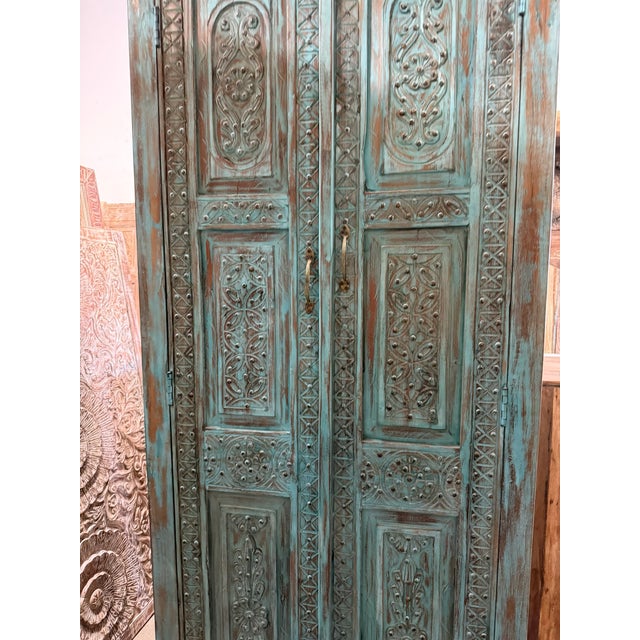 Antique Indian Carved Armoire | Turquoise Cabinet With Brass Stud Accents 80 For Sale In Orlando - Image 6 of 7