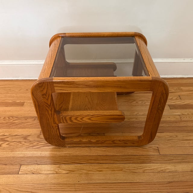 1970s Mid-Century Modern Lou Hodges oak side table. Classic California modern design with curved lines, smoked glass...