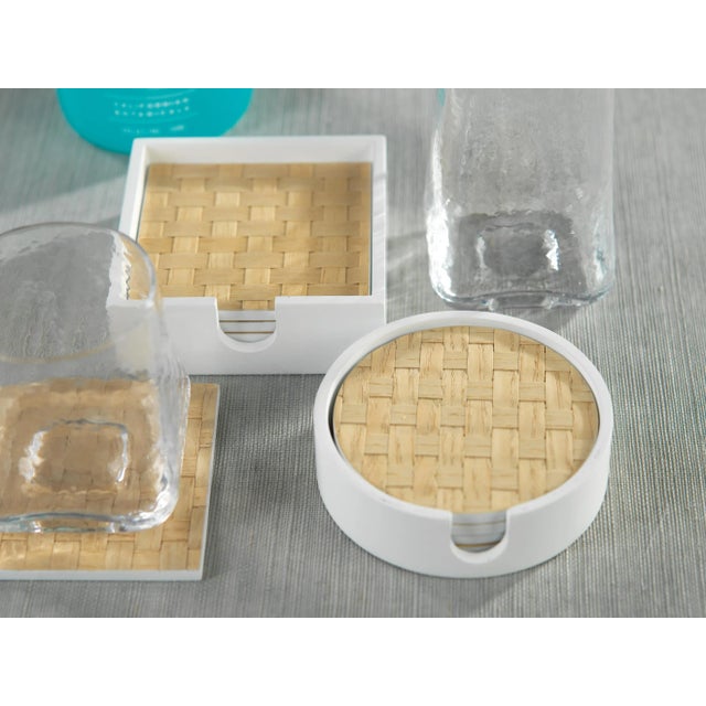 Designed to keep drinks in place and table tops clean, the white case includes enough coasters for your guests at your...