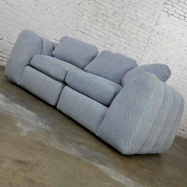 Wonderful modern to postmodern channeled sectional loveseat or lounge chairs in the style of Jay Spectre. Comprised of...
