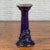 A Chinese antique dark blue glazed pedestal stand with raised motifs. Boasting a lovely dark blue glazed patina, this...