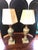 This petite pair of antique Italian pink and black polished marble table lamps feature a neoclassic urn-shaped design on a...